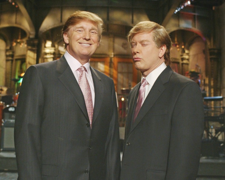 Donald Trump, left, star of The Apprentice, joins Saturday Night Lives Darrell Hammond, who is in character as Trump, as they shoot promo spots for this Saturdays edition of NBCs Saturday Night Live, in New York, Thursday, April 1, 2004. Trump will host the live telecast Saturday, April 3. (AP Photo/NBC, Mary Ellen Matthews) ORG XMIT: NYR104 (television programs)