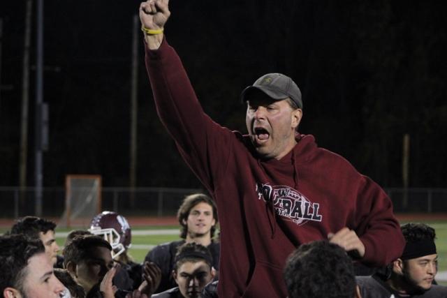 WHHS Football Coach Wayne Demikoff celebrates after an emergency practice in early November.  