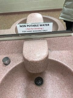 Signs began turning up in bathrooms around the school in early February