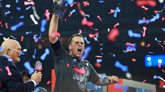 Tom Brady holds his fifth Lombardi trophy after propelling the Patriots to a shocking comeback win in the Super Bowl.