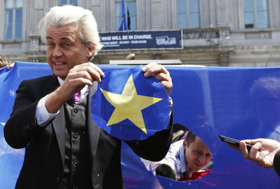 Dutch far-right Freedom Party (PVV) leader Geert Wilders holds a star he had just cut from the European Union flag during a demonstration in front of the EU Parliament in Brussels May 20, 2014. It was meant to be the campaign launch of a new Eurosceptic alliance, but the planned April 16 meeting starring Frances Marine Le Pen and Dutchman Geert Wilders in Strasbourg, home of the European Parliament, never took place.