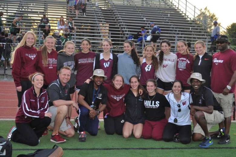 Some of the members of the girls track team that broke multiple records this season.
