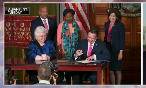 New York Governor Andrew Cuomo signs a controversial late-term abortion bill.