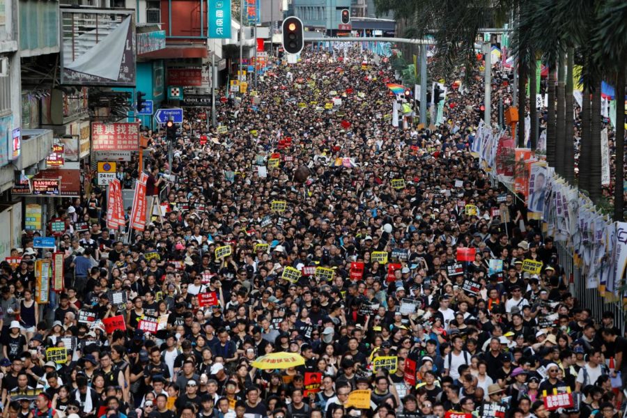 Protestors+marching+against+the+extradition+bill+over+the+summer.
