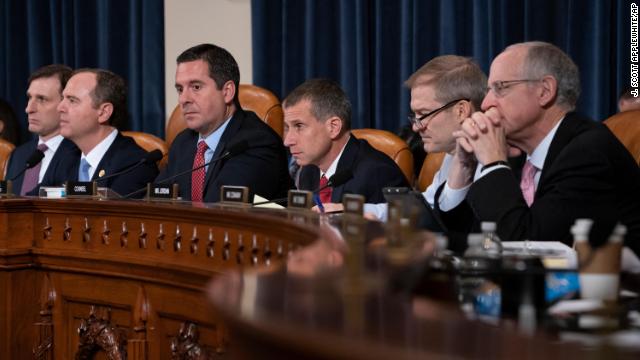 From left, Daniel Goldman, director of investigations for the House Intelligence Committee Democrats, House Intelligence Committee Chairman Adam Schiff, D-Calif., Rep. Devin Nunes, R-Calif, the ranking member, Steve Castor, the Republican staff attorney, Rep. Jim Jordan, R-Ohio, and Rep. Mike Conaway, R-Texas, listen to testimony as the panel holds the first public impeachment hearings of President Trumps efforts to tie U.S. aid for Ukraine to investigations of his political opponents, on Capitol Hill in Washington, Wednesday, Nov. 13, 2019. (AP Photo/J. Scott Applewhite)