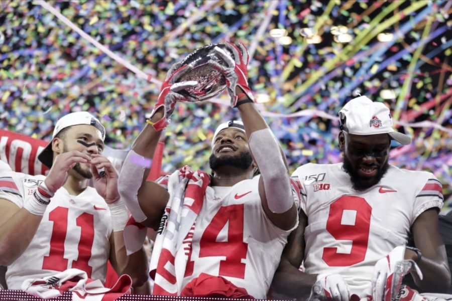 Ohio State players celebrate after defeating Wisconsin 34-21 in the Big Ten Championship Game.