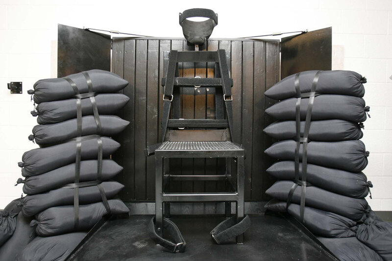 FILE - This June 18, 2010, file photo shows the firing squad execution chamber at the Utah State Prison, in Draper, Utah. A new state report finds that each death row inmate in Utah costs $1.66 million more in taxpayer money than one sentenced to life in prison without parole. State lawmakers weighed the costs of capital punishment Wednesday at a hearing that came after the legislature both brought back the firing squad and seriously considered eliminating death sentences altogether. (Trent Nelson/Salt Lake Tribune via AP, Pool, File)