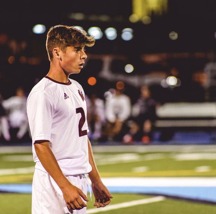 Varsity captain Ryan Schutze looking down the field during a game