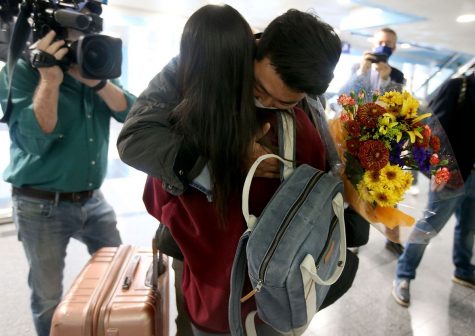 Loved ones reuniting after travel restricitons are changing and easing up