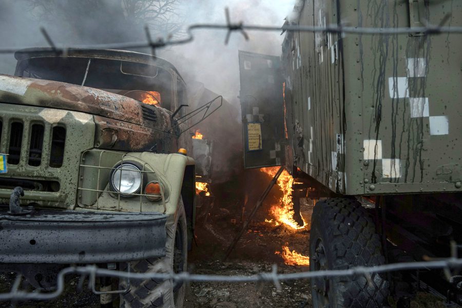 Mandatory Credit: Photo by Evgeniy Maloletka/AP/Shutterstock (12820719f)
Ukrainian military track burns at an air defence base in the aftermath of an apparent Russian strike in Mariupol, Ukraine, . Russian troops have launched their anticipated attack on Ukraine. Big explosions were heard before dawn in Kyiv, Kharkiv and Odesa as world leaders decried the start of Russian invasion that could cause massive casualties and topple Ukraines democratically elected government
Tensions, Mariupol, Ukraine - 24 Feb 2022