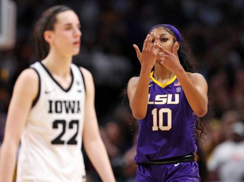 DALLAS, TEXAS - APRIL 02: Angel Reese #10 of the LSU Lady Tigers reacts towards Caitlin Clark #22 of the Iowa Hawkeyes during the fourth quarter during the 2023 NCAA Womens Basketball Tournament championship game at American Airlines Center on April 02, 2023 in Dallas, Texas. (Photo by Maddie Meyer/Getty Images)