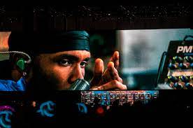 A photo taken of Frank Ocean on a large screen during his show (via: The Desert Sun)
