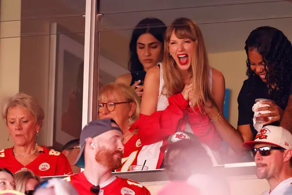 Taylor Swift cheers on Travis Kelce after his touchdown.
Courtesy of The New York Times