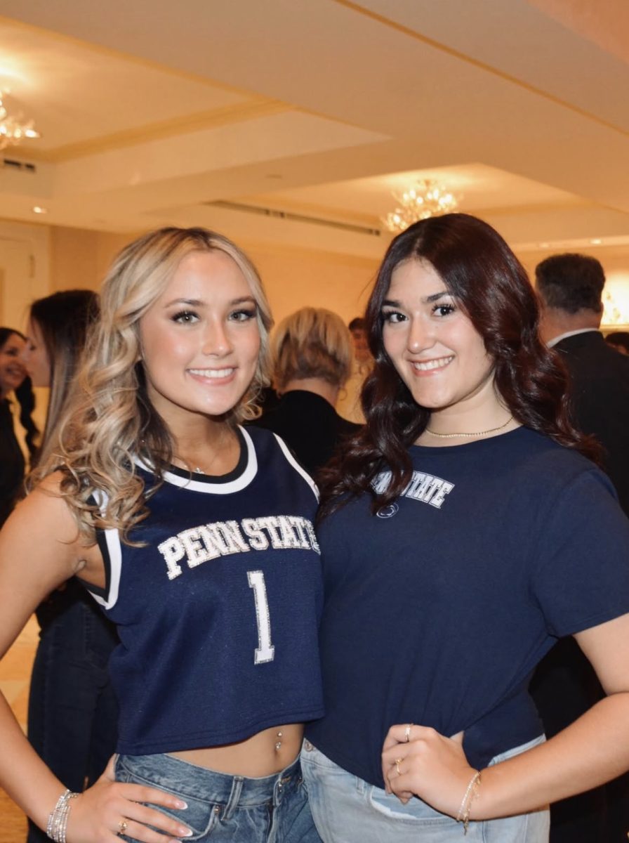 Kailin Leszkowicz and Samantha Storzillo posing together in their Penn State shirts